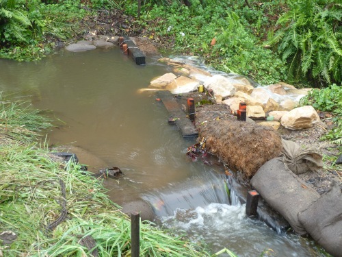Fig 1: Notched weir diverting water towards sedimentation pond.